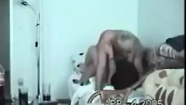 Young indian girl teaching indian how to wear a...