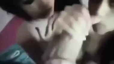 2 Indian girls sucking a big cock