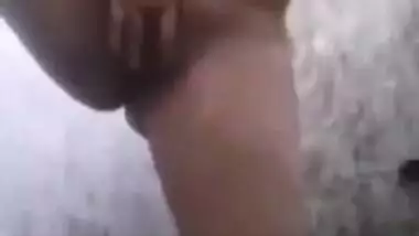 Beautiful Desi chick sings as taking a shower and fingering XXX twat