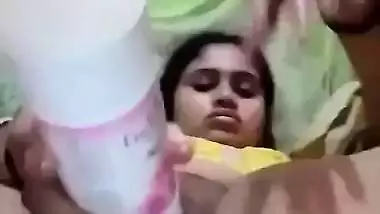 Desi babe using room freshener bottle to masturbate