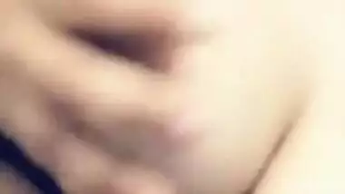 Indian babe's breasts are so big that she can easily lick nipples