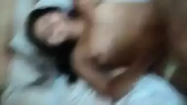Desi girl keenly lies in bed exposing small XXX boobs on camera