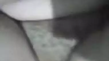 Aunty puts camera down to film how she masturbates hairy pussy